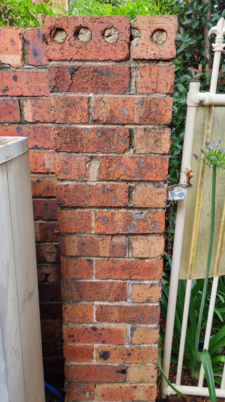 Laying brick on top of existing wall