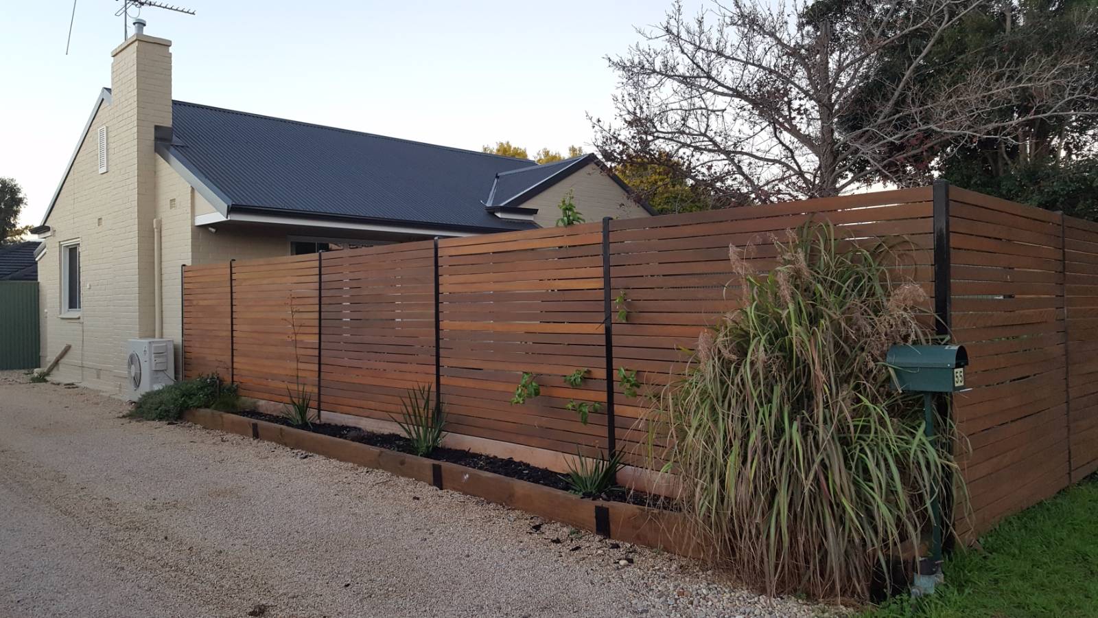 Front fence/driveway - Narrow bush