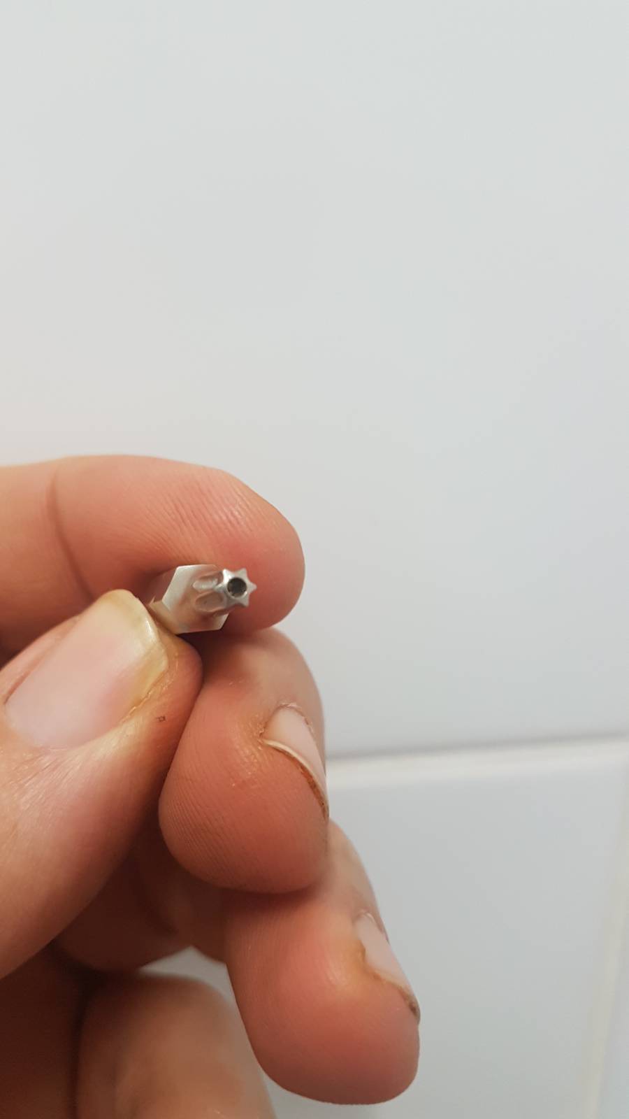 Undoing rounded hex bolt on towel rail