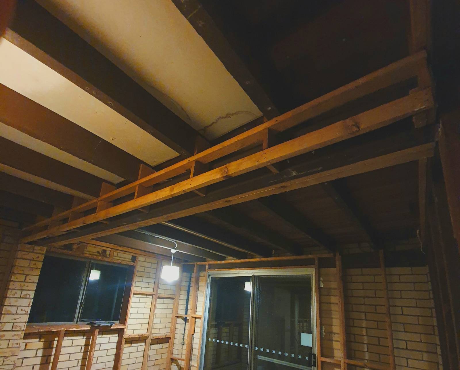 Bracing timber beam under house