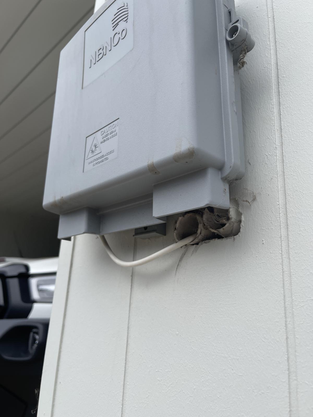 Exposed wires/conduits NBN box