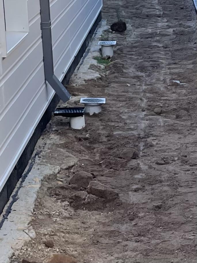 Down pipe connection to storm water? Is this correct?